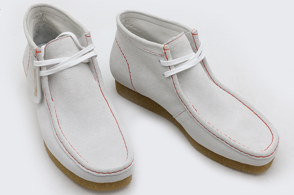 white wallabee boot